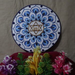 Intricate lippon art with Sri Aurobindo's symbol